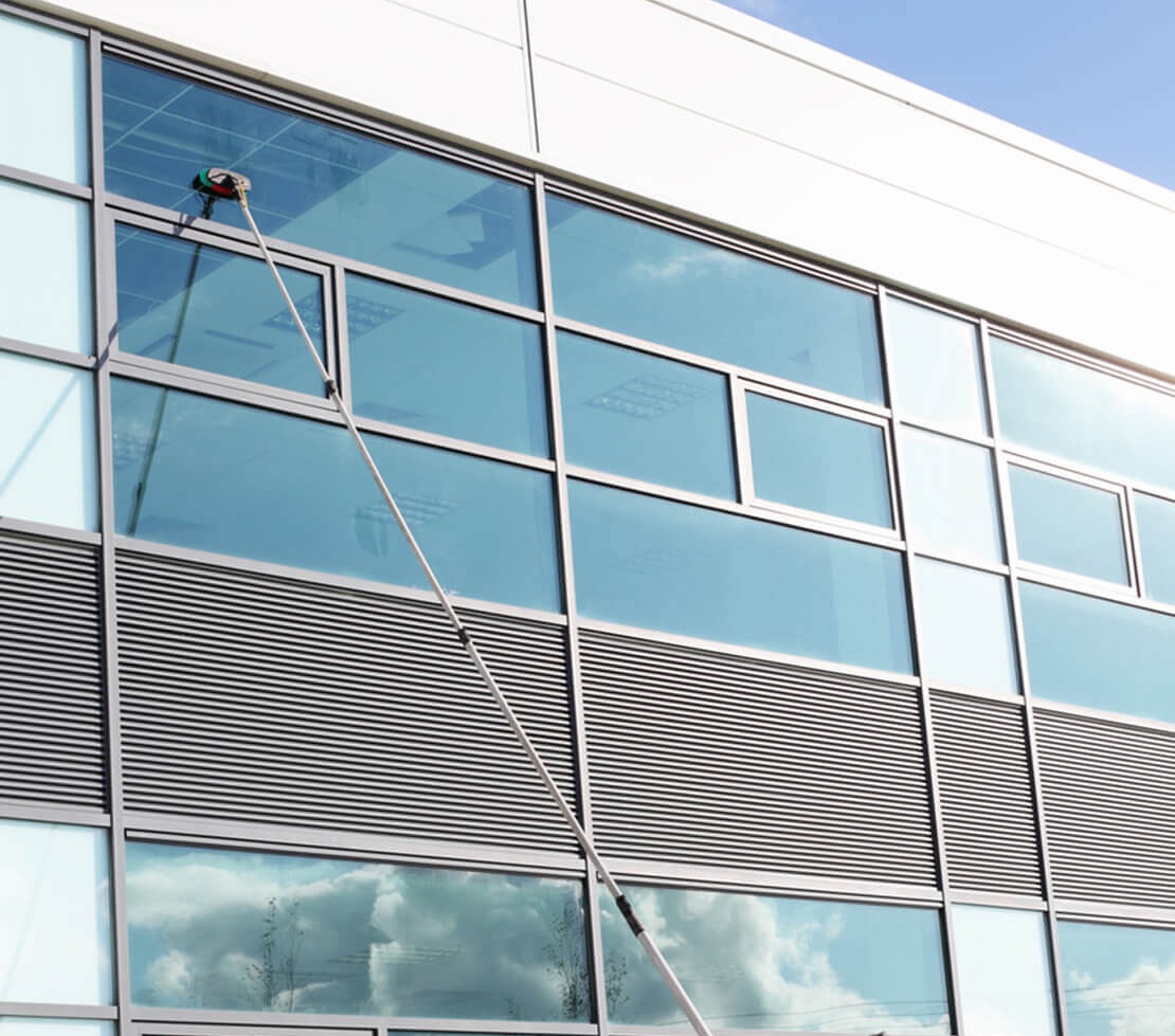 Visual transformation of a window from dirty to sparkling clean after our window cleaning service.